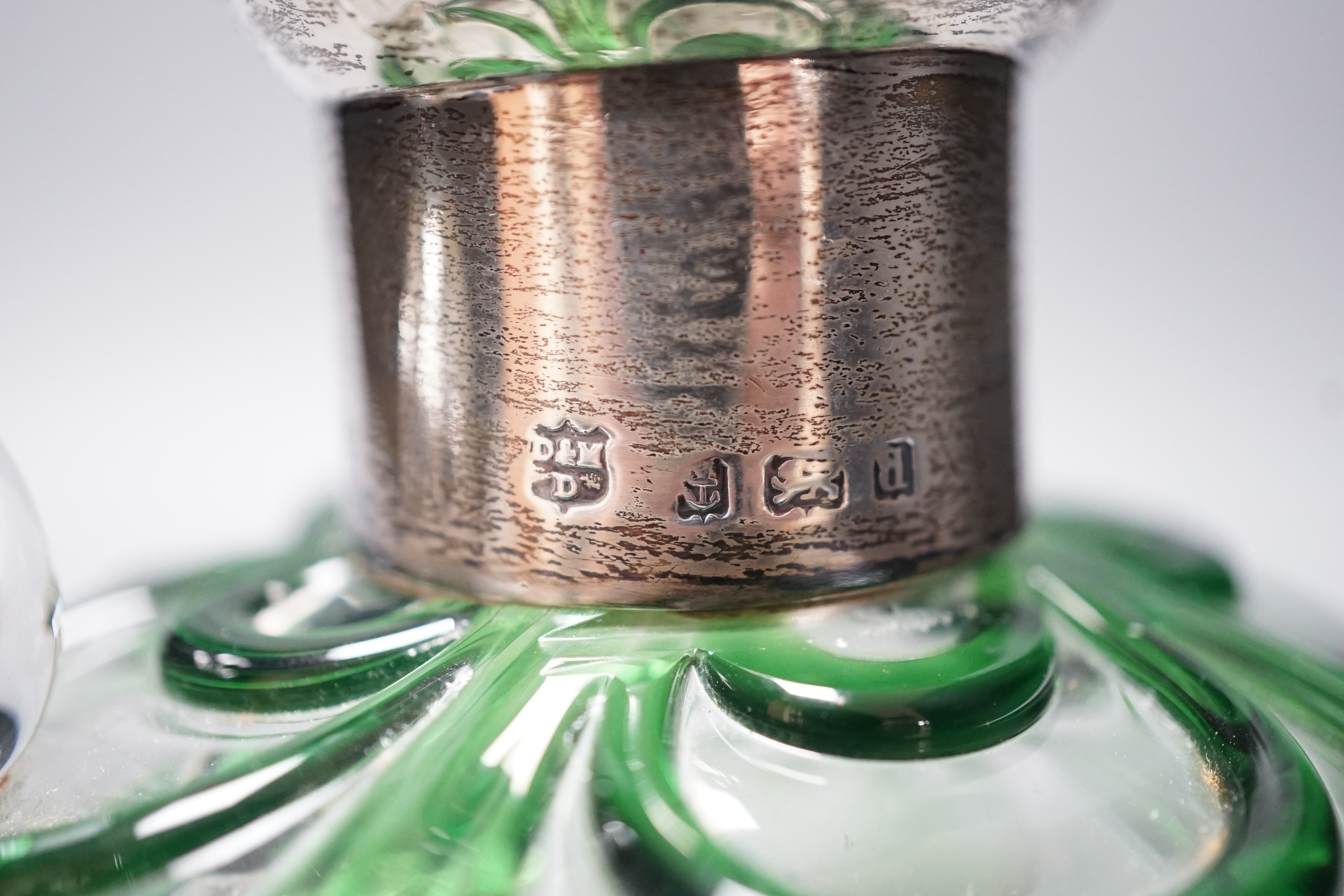 A late Victorian Art Nouveau silver mounted glass claret jug and stopper, D & M Davis, Birmingham, 1900, the glass with ribbed green swags, height 20.7cm.